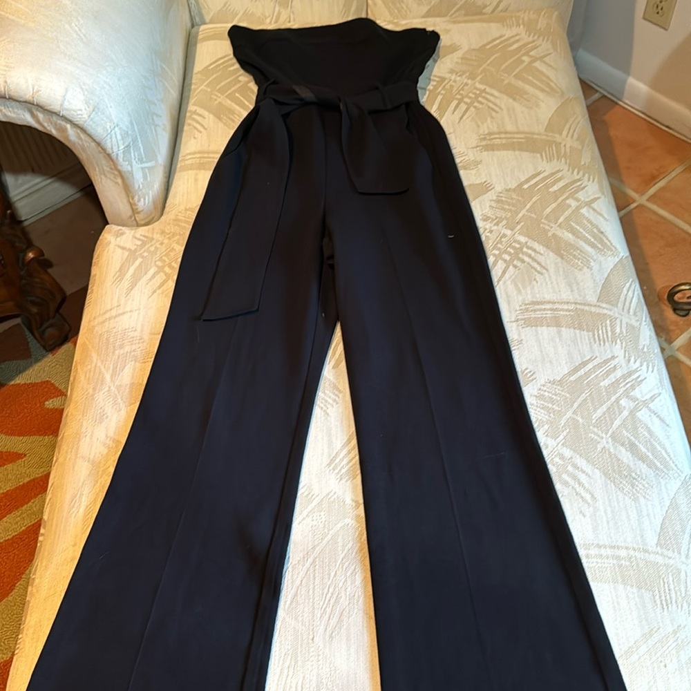 Strapless black jumpsuit with belt